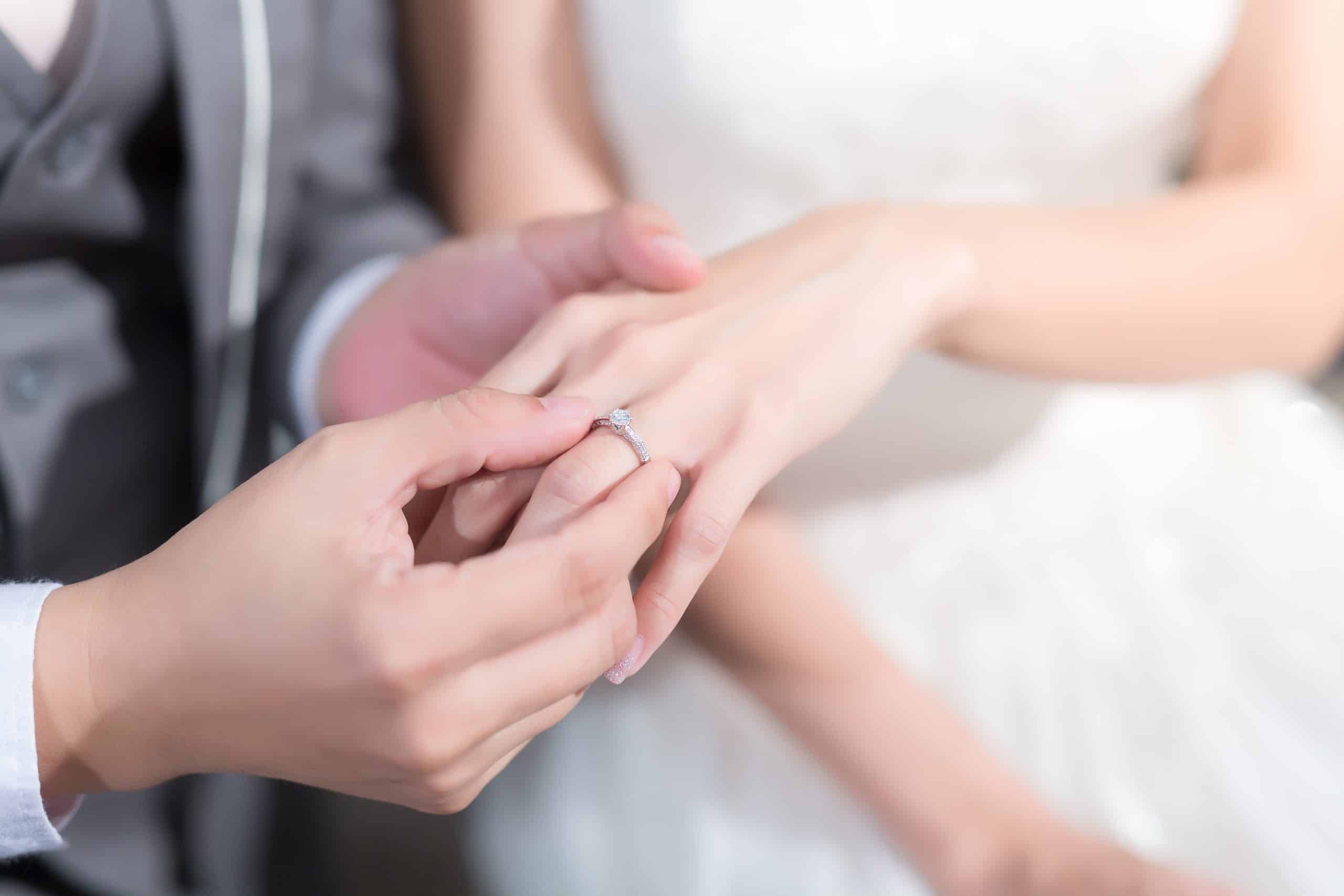 Wedding ceremony. The bride and groom exchange wedding rings.
