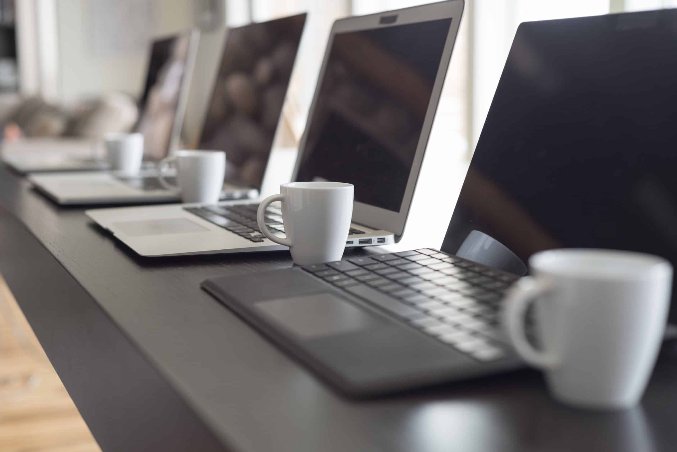 Laptops and espresso shots lined up